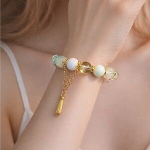 Emerald Whisper Tassel Bracelet”